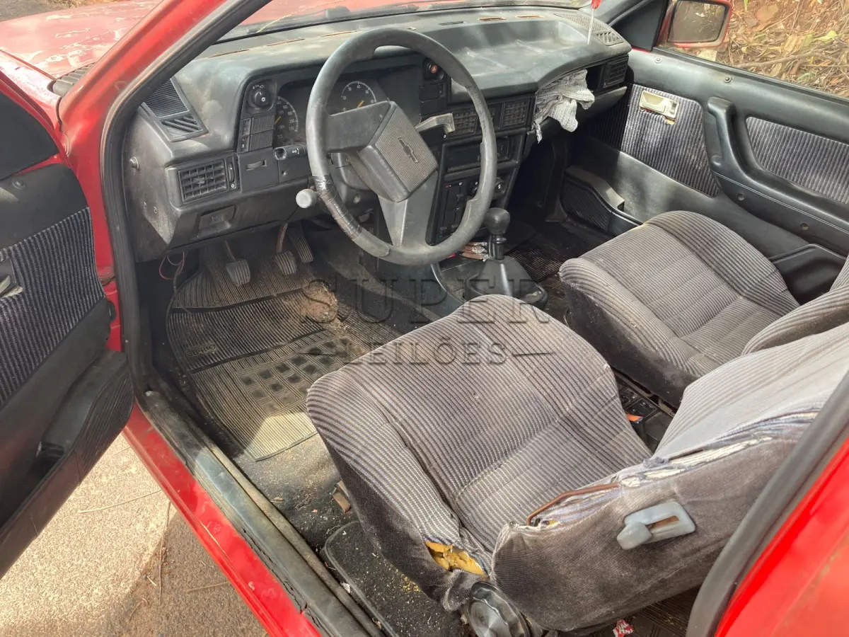 LOTE 001 - VEICULO GM/KADETT SL/E, PLACAS IBG8394, GASOLINA, VERMELHA, ANO/MODELO 1989