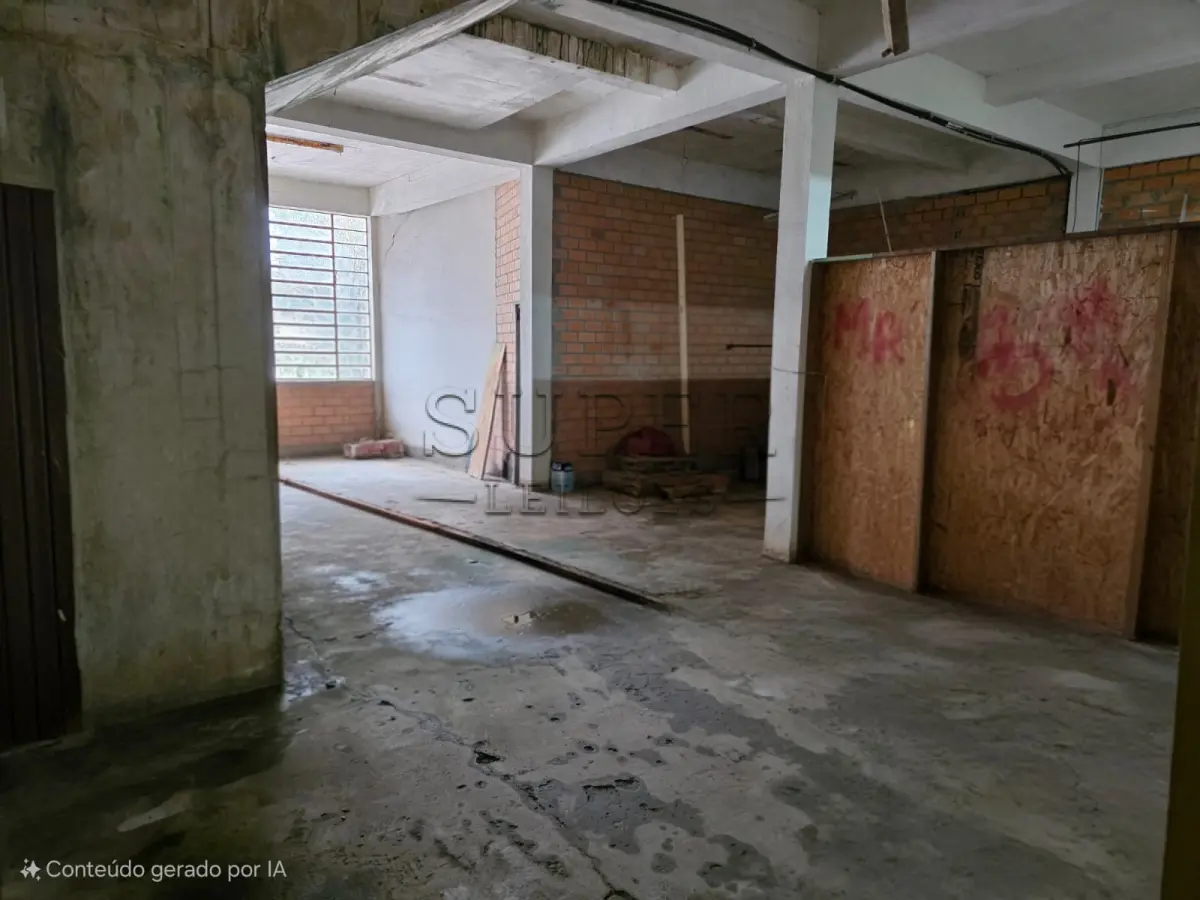 LOTE 000 - UM PRÉDIO DE ALVENARIA, constituído de um salão para fins comerciais, a Rua Ivo Becker, sob número 85,  Cachoeira do Sul/RS