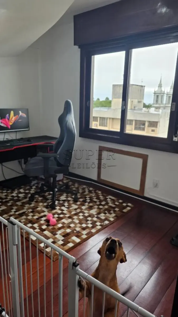 LOTE 002 - Um apartamento nº 801 do Edifício Condomínio Residencial União de Moços, localizado na Rua Sete de Setembro, 744, no município de Cachoeira do Sul - RS