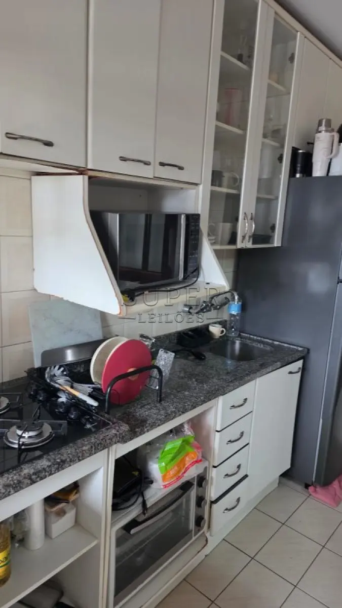 LOTE 002 - Um apartamento nº 801 do Edifício Condomínio Residencial União de Moços, localizado na Rua Sete de Setembro, 744, no município de Cachoeira do Sul - RS