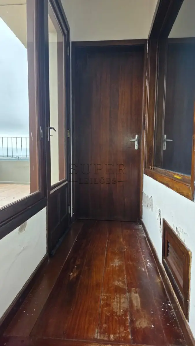 LOTE 002 - Um apartamento nº 801 do Edifício Condomínio Residencial União de Moços, localizado na Rua Sete de Setembro, 744, no município de Cachoeira do Sul - RS
