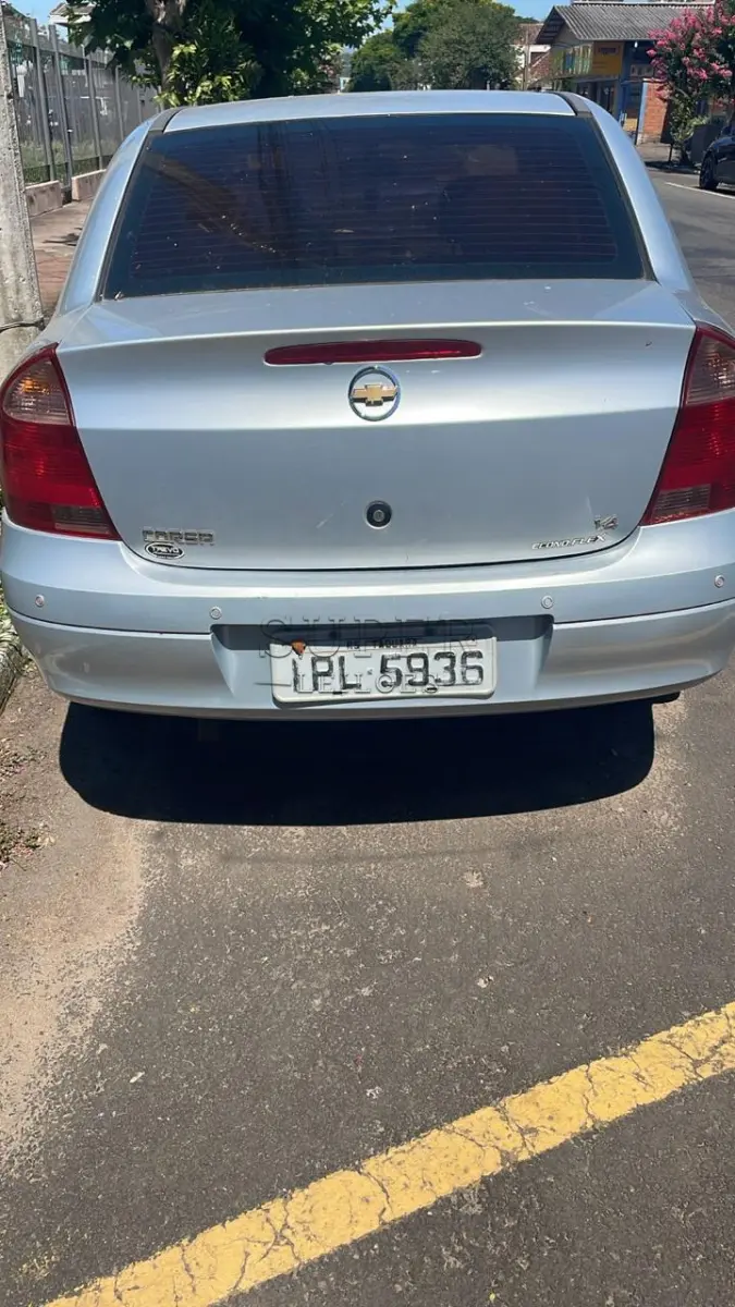 LOTE 000 - GM/Corsa Sed. Premium 1.4 8V ECONOFLEX 4p, 2009, COR PRATA, PLACA IPL5936