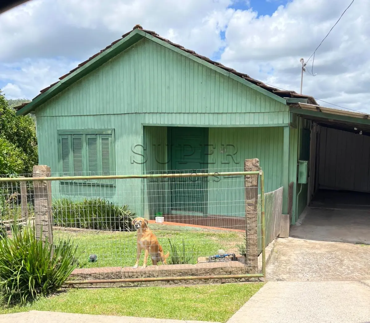 LOTE 008 - Terreno urbano com edificação de madeira, totalizando 366,74m2 no bairro Baixada em Sobradinho/RS