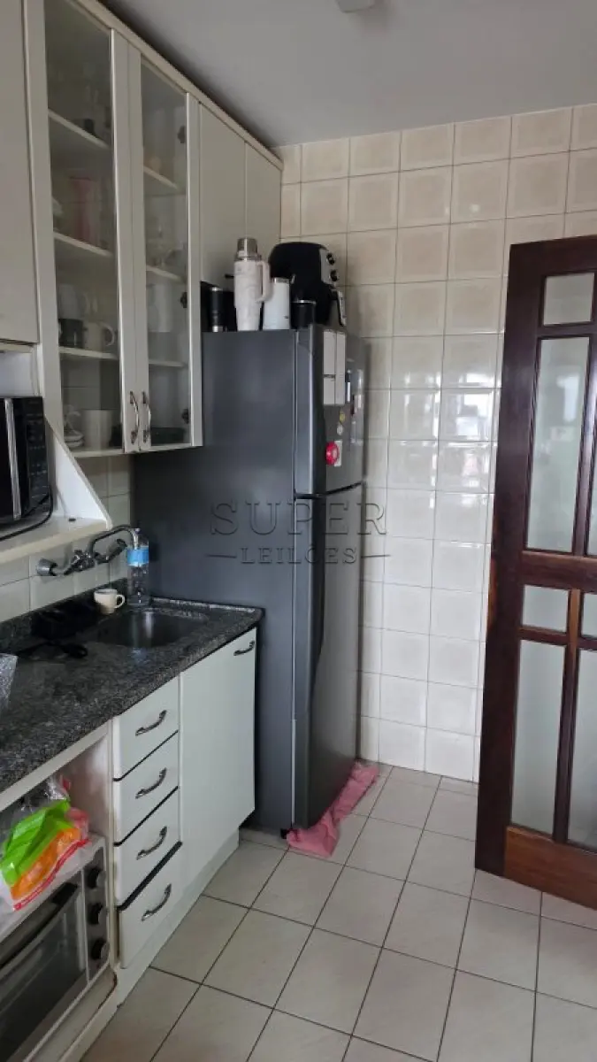 LOTE 002 - Um apartamento nº 801 do Edifício Condomínio Residencial União de Moços, localizado na Rua Sete de Setembro, 744, no município de Cachoeira do Sul - RS