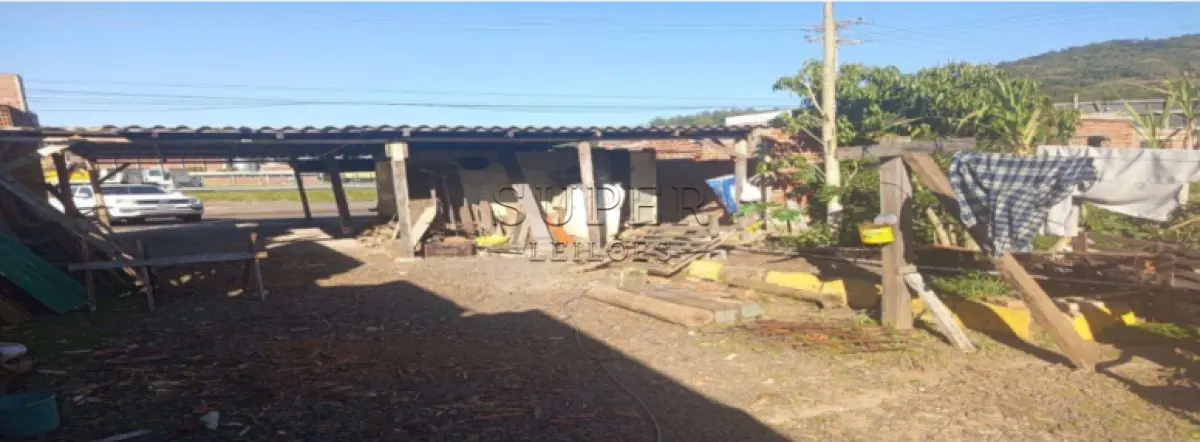 LOTE 002 - UM IMÓVEL URBANO, com benfeitorias não averbadas, com a área de 1.302,00m², Av. Presidente Tancredo Neves n 14.709, bairro Rothmann no município de Igrejinha/RS, sob matrícula nº 3907 do CRI de Igrejinha/RS