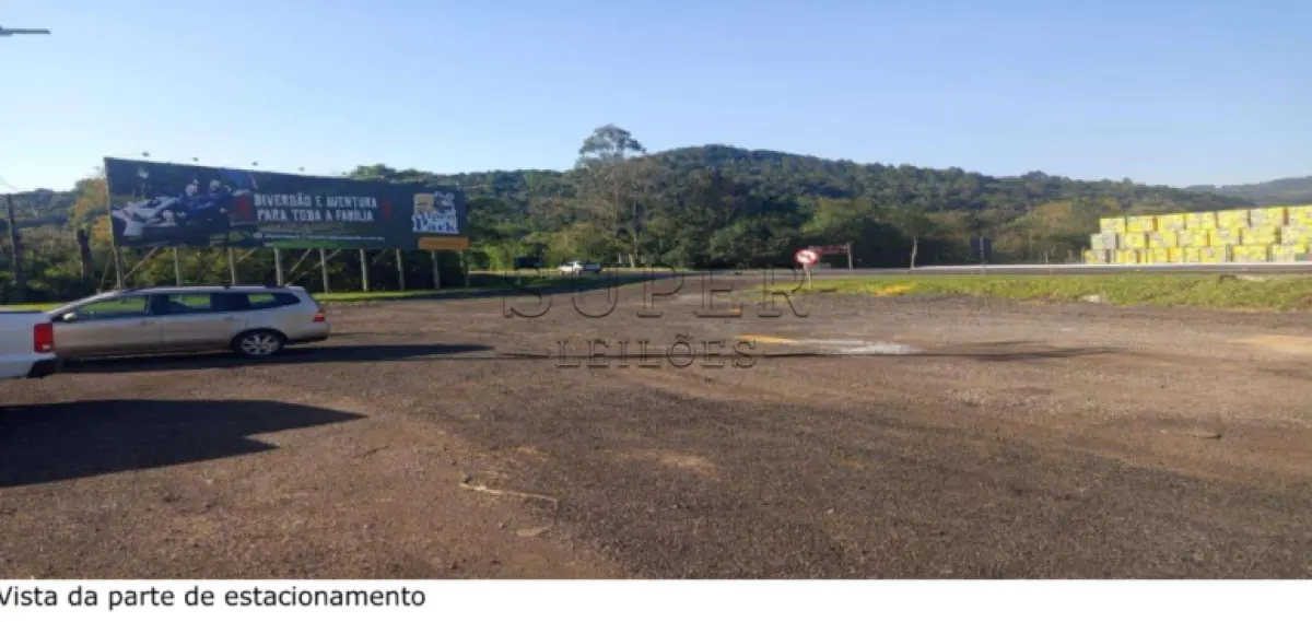 LOTE 002 - UM IMÓVEL URBANO, com benfeitorias não averbadas, com a área de 1.302,00m², Av. Presidente Tancredo Neves n 14.709, bairro Rothmann no município de Igrejinha/RS, sob matrícula nº 3907 do CRI de Igrejinha/RS