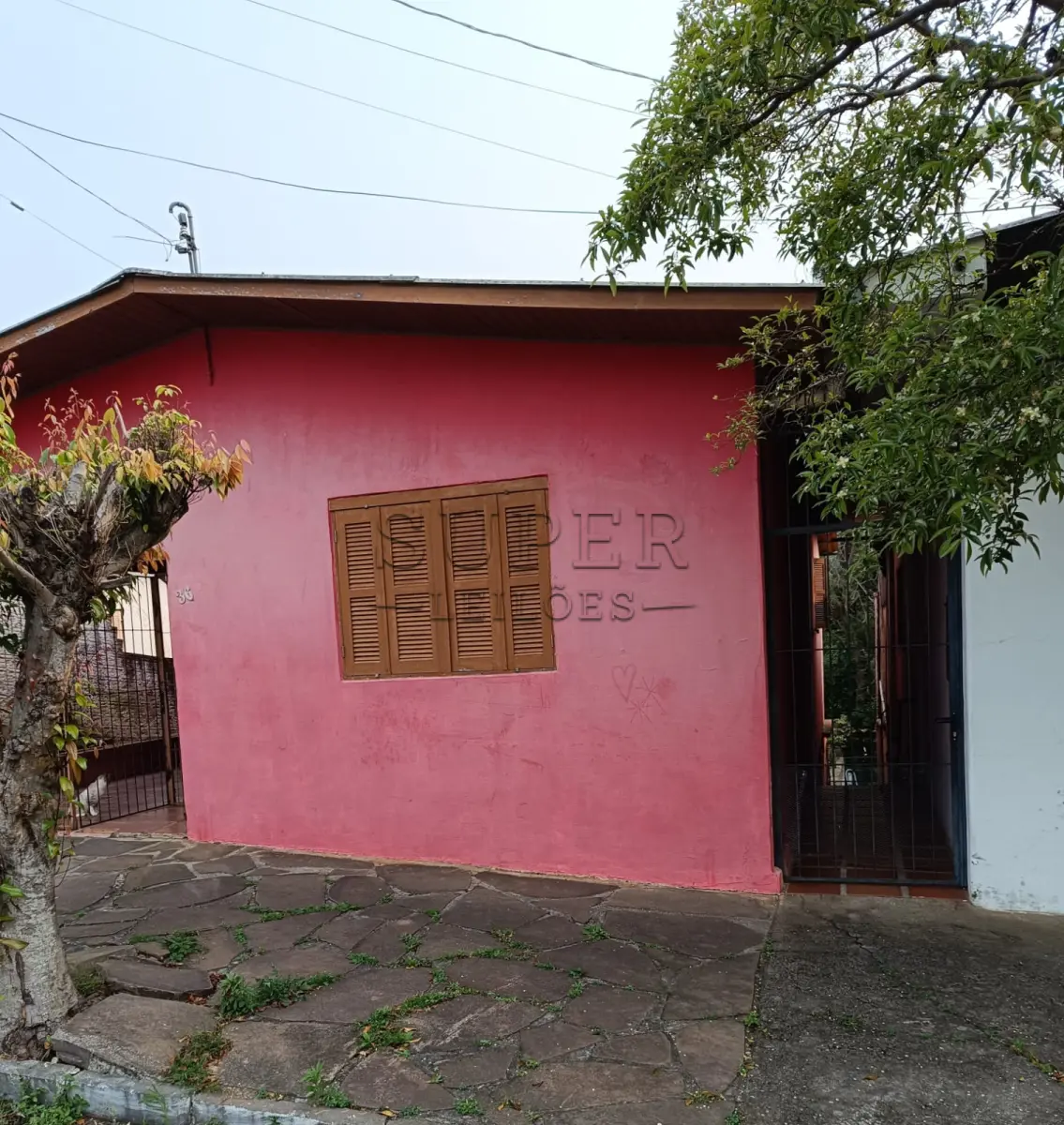 LOTE 001 - Casa de Alvenaria om área de 149,80m², situado na Rua Guaporé e Sobradinho/RS