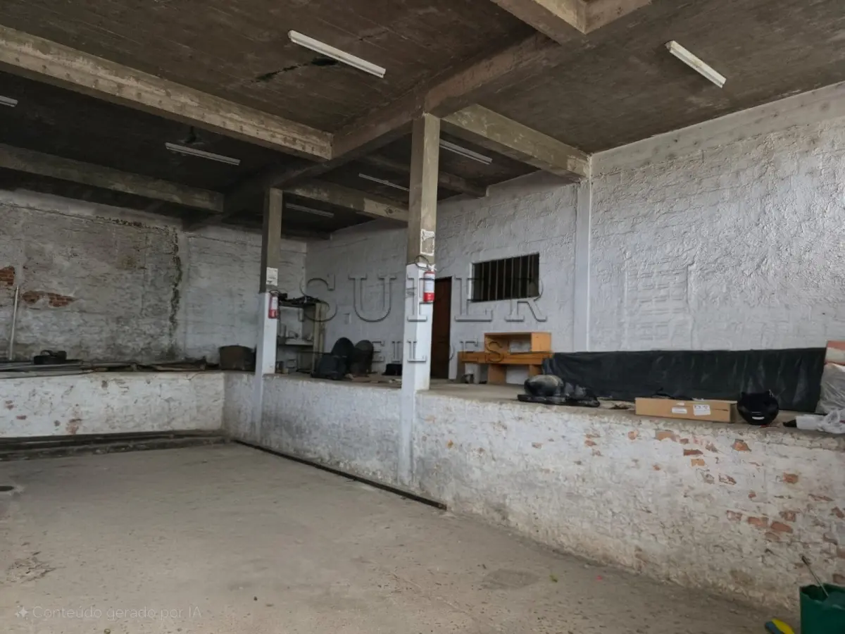 LOTE 000 - UM PRÉDIO DE ALVENARIA, constituído de um salão para fins comerciais, a Rua Ivo Becker, sob número 85,  Cachoeira do Sul/RS
