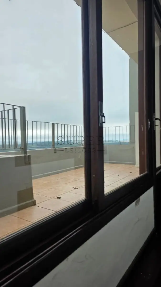 LOTE 002 - Um apartamento nº 801 do Edifício Condomínio Residencial União de Moços, localizado na Rua Sete de Setembro, 744, no município de Cachoeira do Sul - RS