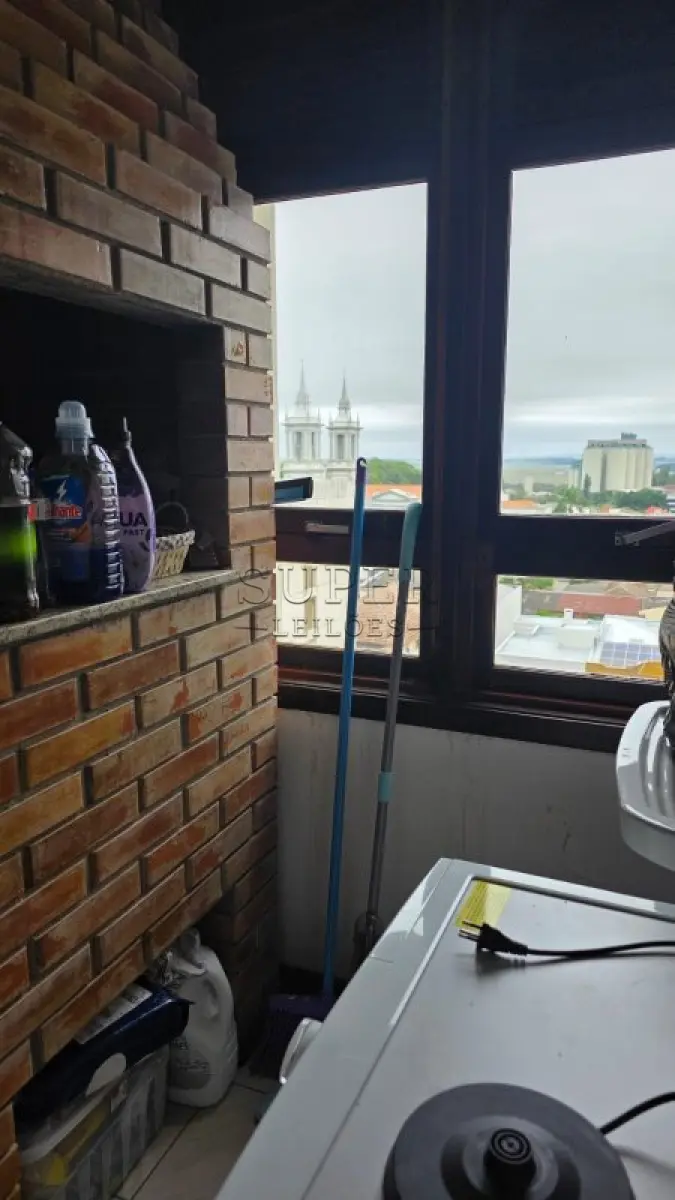 LOTE 002 - Um apartamento nº 801 do Edifício Condomínio Residencial União de Moços, localizado na Rua Sete de Setembro, 744, no município de Cachoeira do Sul - RS
