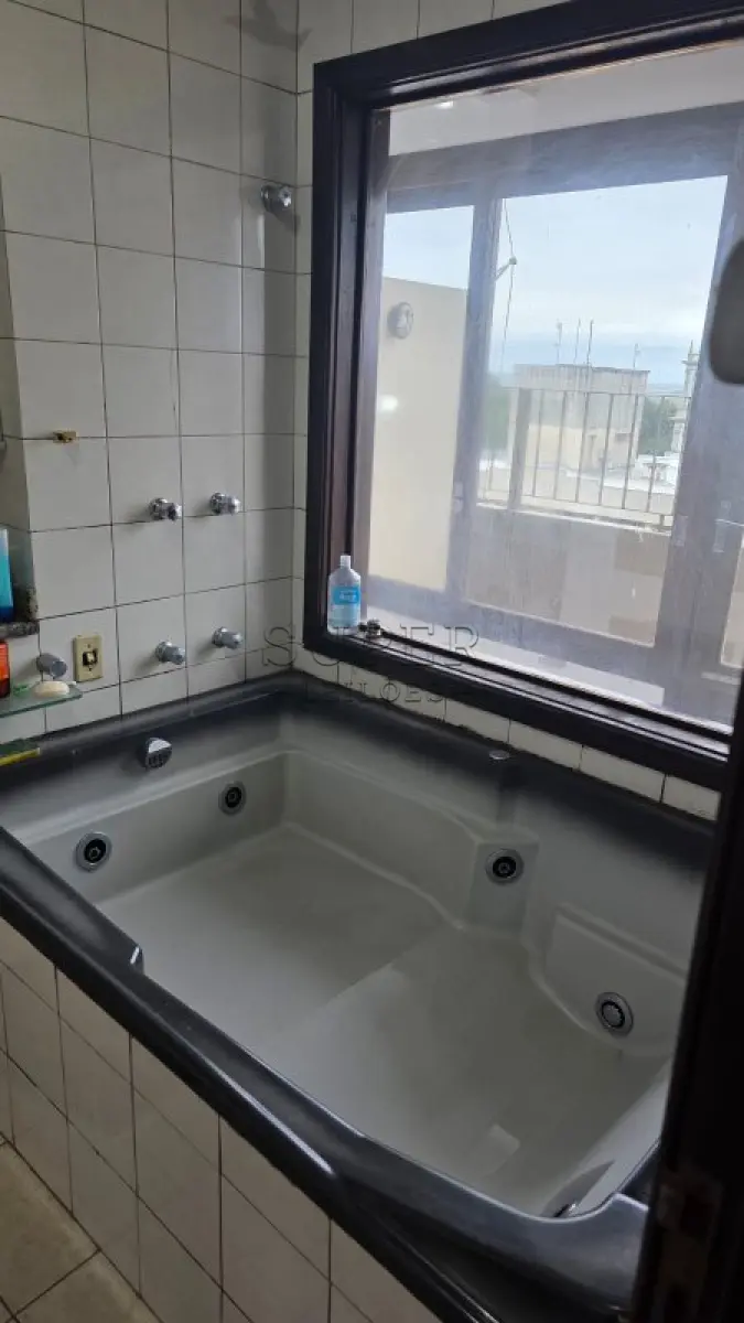 LOTE 002 - Um apartamento nº 801 do Edifício Condomínio Residencial União de Moços, localizado na Rua Sete de Setembro, 744, no município de Cachoeira do Sul - RS