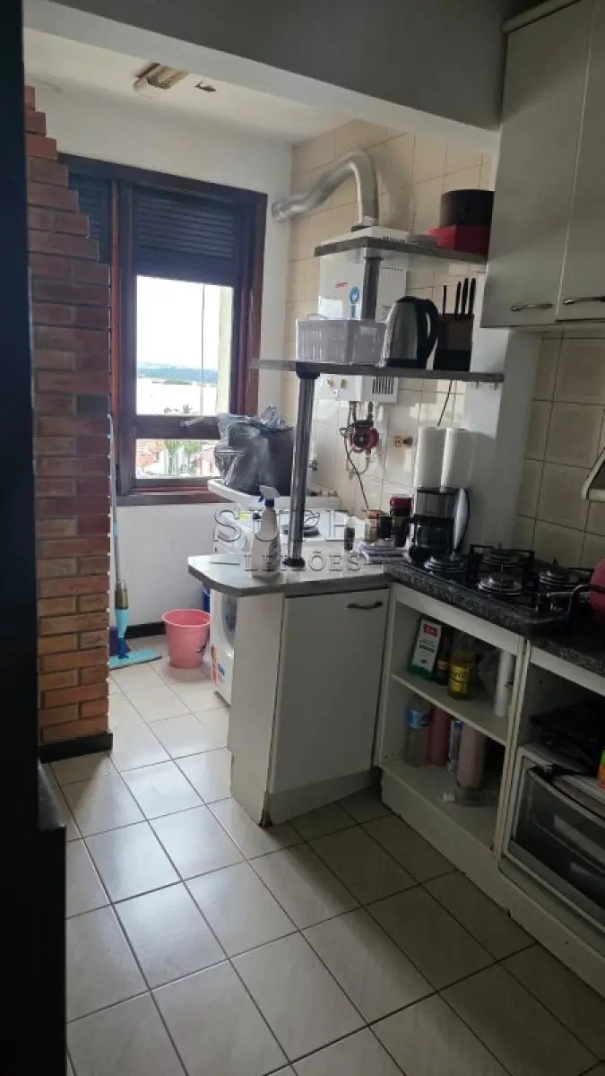 LOTE 002 - Um apartamento nº 801 do Edifício Condomínio Residencial União de Moços, localizado na Rua Sete de Setembro, 744, no município de Cachoeira do Sul - RS