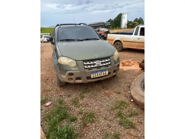 UMA CAMIONETA FIAT STRADA ADV DUAL PLACA ISX4F44,ANO/MODELO 2012